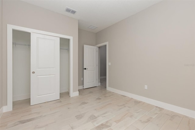 13457 SW 53rd St, Ocala, FL 34481 - unfurnished bedroom with a closet and baseboards