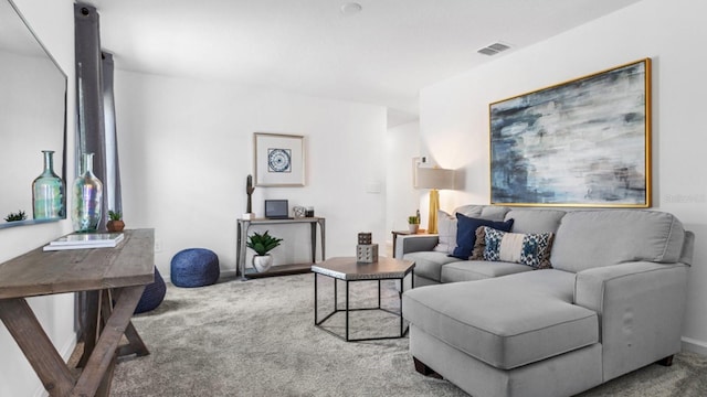 132 Adventure Ave, Davenport, FL 33837 - carpeted living room featuring visible vents and baseboards