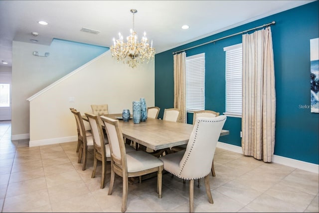 7463 Marker Ave, Kissimmee, FL 34747 - dining area featuring light tile patterned floors, baseboards, visible vents, an inviting chandelier, and recessed lighting