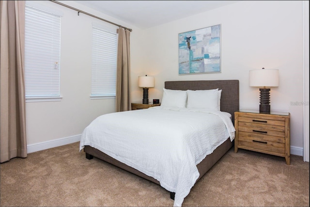 7463 Marker Ave, Kissimmee, FL 34747 - carpeted bedroom featuring baseboards
