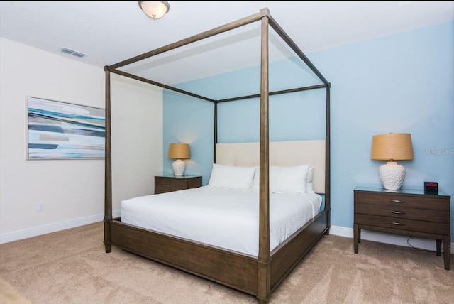 7463 Marker Ave, Kissimmee, FL 34747 - bedroom with visible vents, baseboards, and carpet