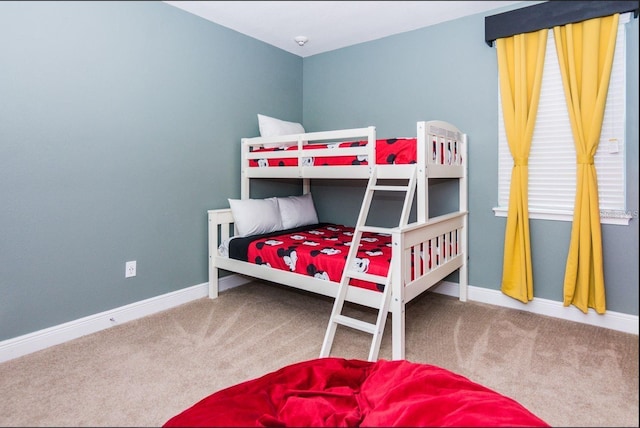 7463 Marker Ave, Kissimmee, FL 34747 - carpeted bedroom featuring baseboards