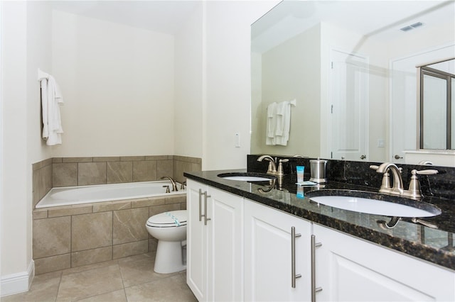 7463 Marker Ave, Kissimmee, FL 34747 - bathroom with a sink, visible vents, a bath, and tile patterned floors
