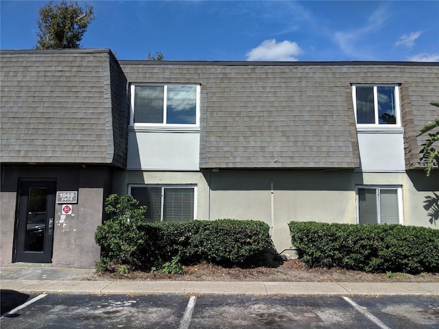 exterior space featuring uncovered parking