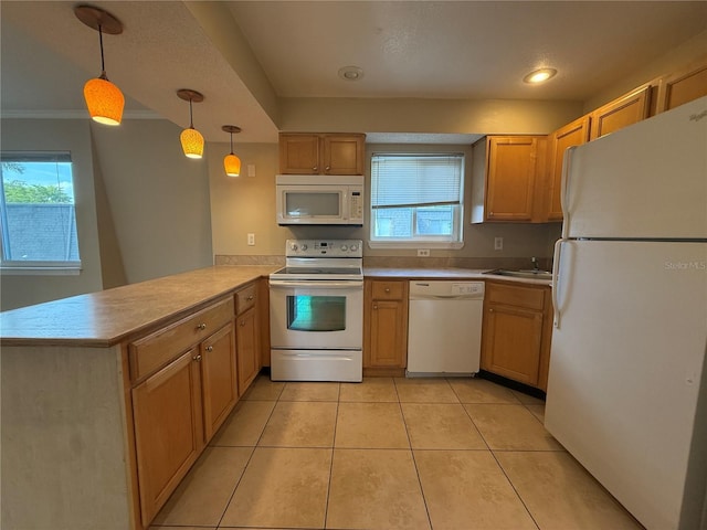 kitchen with white appliances, a peninsula, light countertops, light tile patterned floors, and hanging light fixtures