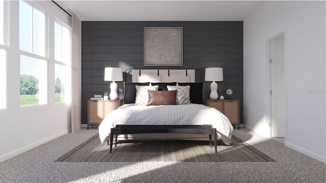 carpeted bedroom with baseboards