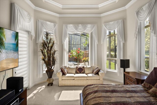 bedroom with crown molding, carpet, and baseboards