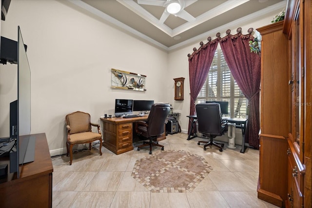 office space with a ceiling fan, baseboards, a tray ceiling, light tile patterned flooring, and crown molding