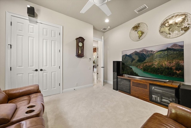 carpeted living area with visible vents, recessed lighting, baseboards, and a ceiling fan