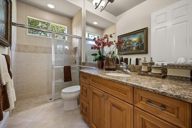 full bathroom with vanity, recessed lighting, tile patterned flooring, a shower stall, and toilet