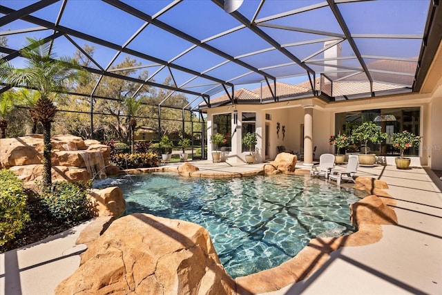 pool featuring a patio area and a lanai