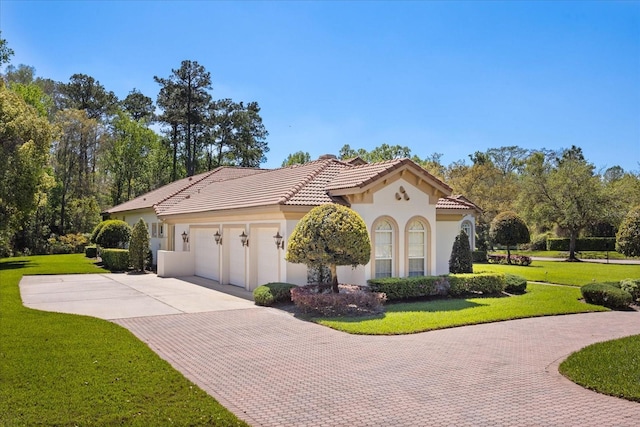 view of home's exterior with stucco siding, decorative driveway, a yard, an attached garage, and a tiled roof