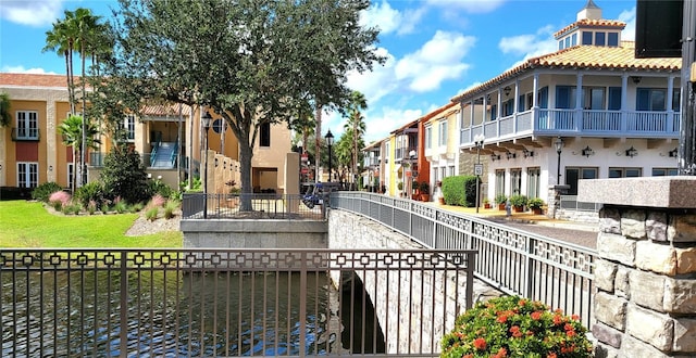 view of community featuring a residential view and fence private yard