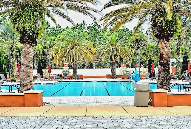 pool with a patio