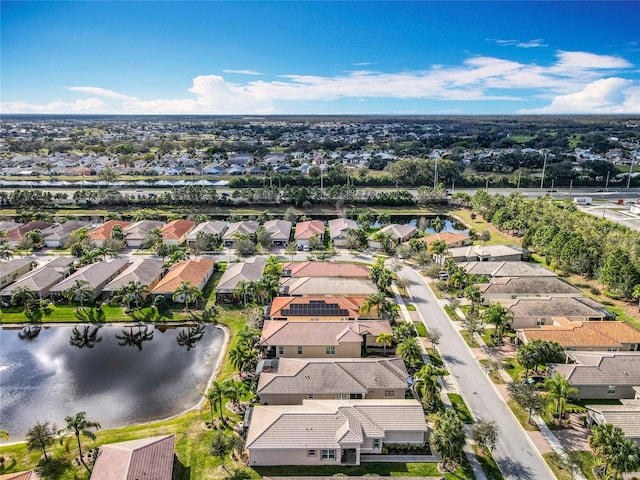 birds eye view of property featuring a residential view and a water view