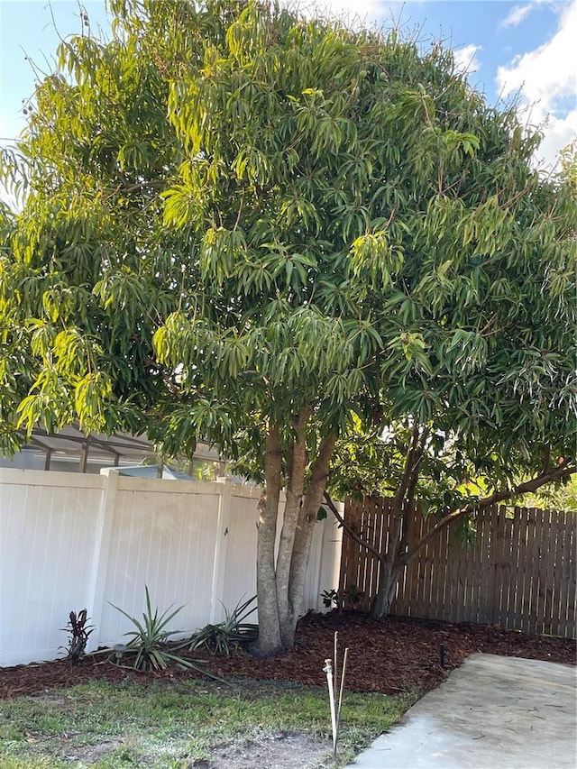 view of property exterior with fence