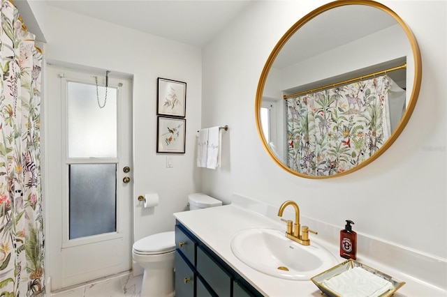 full bath featuring a shower with shower curtain, toilet, marble finish floor, and vanity