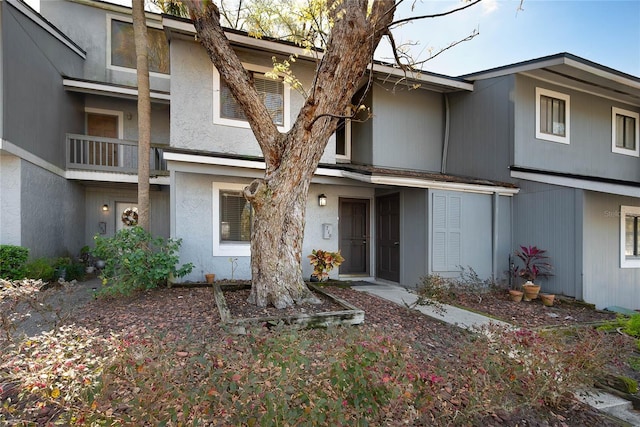 multi unit property featuring stucco siding