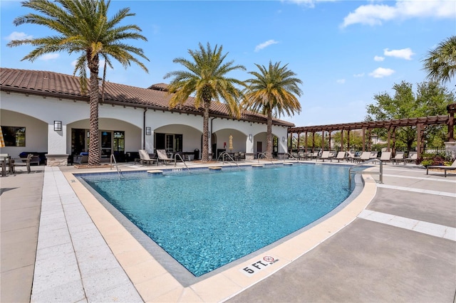 pool with a patio area