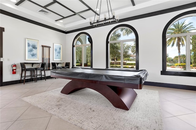 recreation room featuring tile patterned floors, visible vents, and plenty of natural light