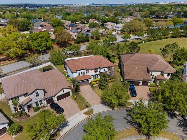 birds eye view of property with a residential view