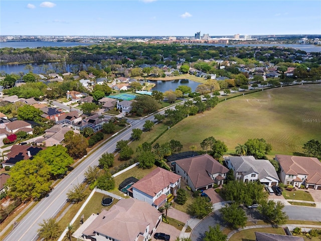 aerial view featuring a residential view and a water view