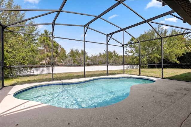 outdoor pool with a lanai and a patio