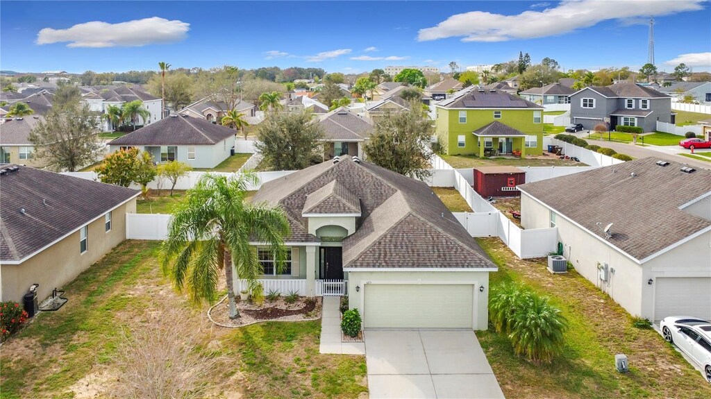 673 Highland Meadows Ave, Davenport, FL 33837 - bird's eye view featuring a residential view