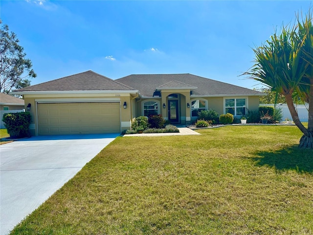 ranch-style house with stucco siding, driveway, a garage, and a front lawn