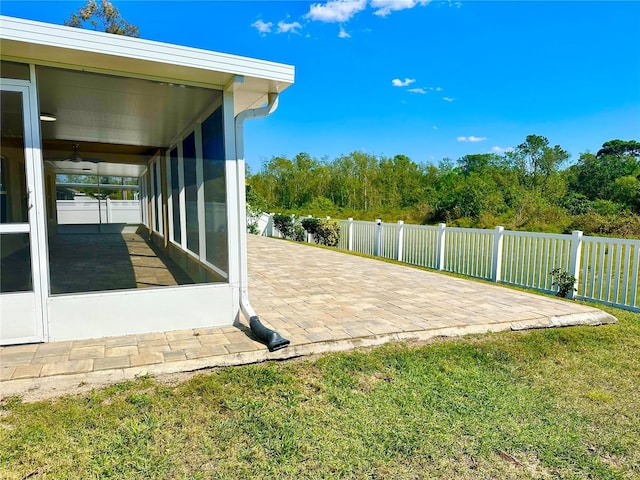 view of patio / terrace featuring fence