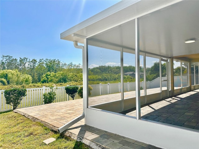 view of patio featuring fence