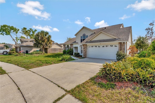 view of front of home featuring fence, driveway, an attached garage, a front lawn, and brick siding