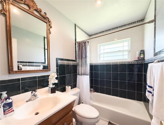 bathroom featuring vanity, tile walls, toilet, and shower / bath combo with shower curtain