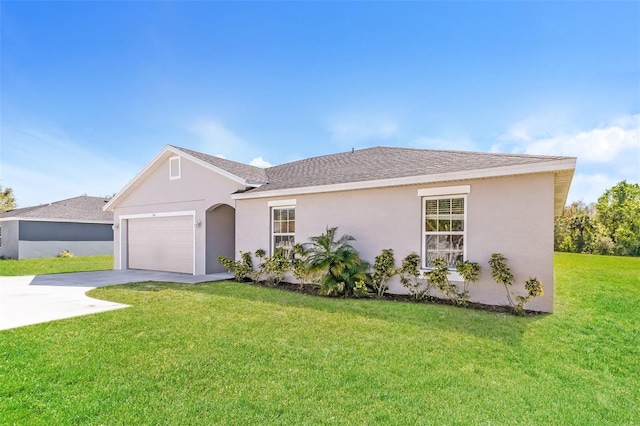 ranch-style home featuring a shingled roof, a front lawn, stucco siding, a garage, and driveway