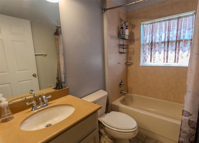 bathroom featuring vanity, shower / bath combination with curtain, and toilet