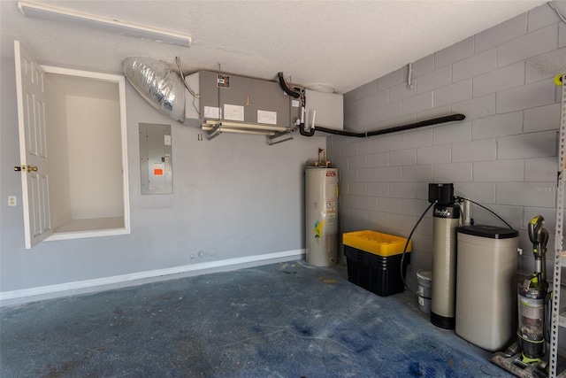 garage featuring concrete block wall, electric panel, baseboards, and water heater