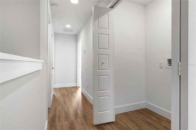 4409 Summer Flowers Pl, Kissimmee, FL 34746 - corridor with recessed lighting, visible vents, baseboards, and wood finished floors
