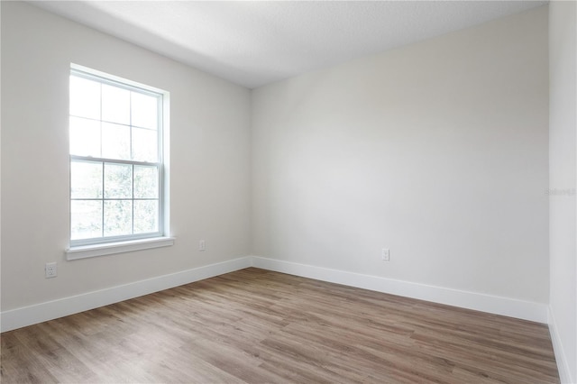 4409 Summer Flowers Pl, Kissimmee, FL 34746 - unfurnished room featuring baseboards and wood finished floors