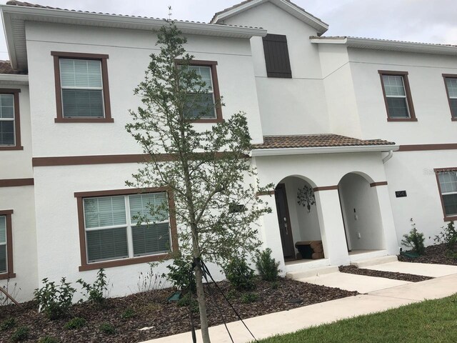 view of property with stucco siding