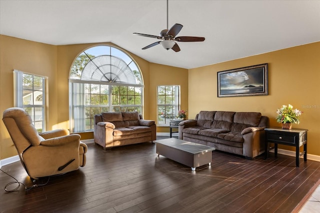 living area featuring wood finished floors, plenty of natural light, ceiling fan, and vaulted ceiling