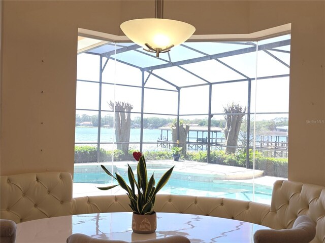 9137 Southern Breeze Dr, Orlando, FL 32836 - interior space with a water view and a sunroom