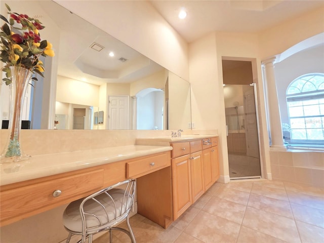 9137 Southern Breeze Dr, Orlando, FL 32836 - bathroom featuring vanity, tile patterned flooring, decorative columns, visible vents, and a stall shower