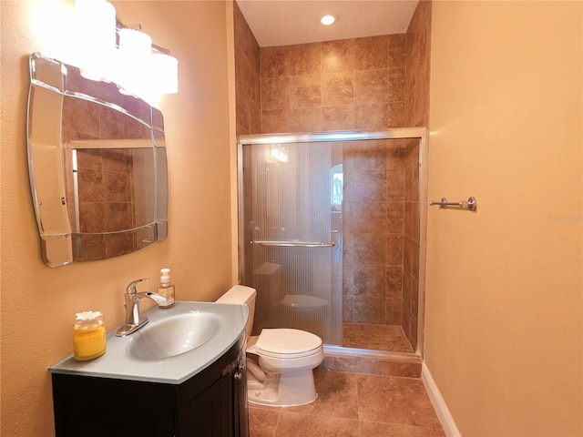 9137 Southern Breeze Dr, Orlando, FL 32836 - full bathroom with vanity, tile patterned flooring, toilet, and a shower stall