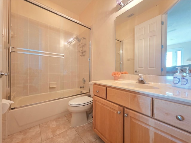 9137 Southern Breeze Dr, Orlando, FL 32836 - full bathroom featuring vanity, tub / shower combination, tile patterned floors, and toilet