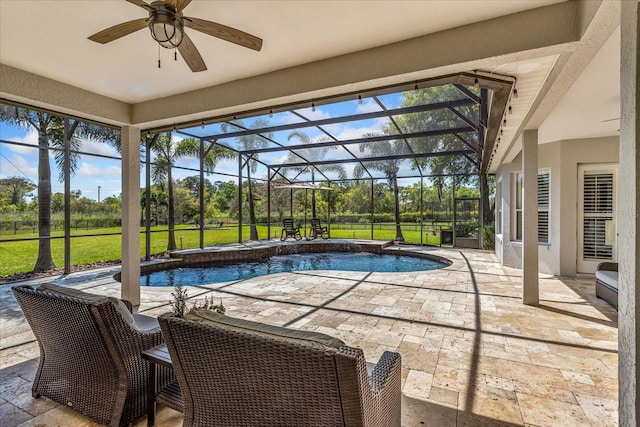 pool featuring a patio, a ceiling fan, and a lanai