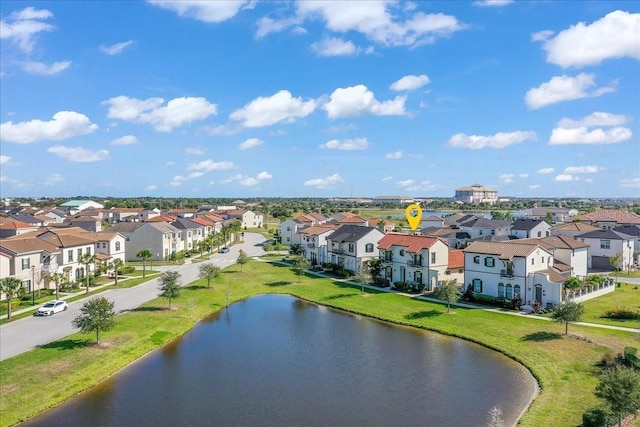 aerial view featuring a residential view and a water view