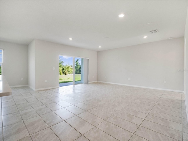 spare room featuring recessed lighting, visible vents, baseboards, and light tile patterned flooring