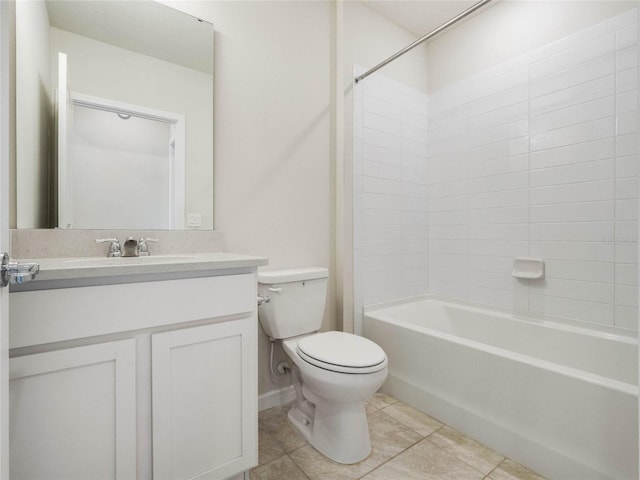 full bath with tile patterned flooring, toilet, vanity, and bathing tub / shower combination