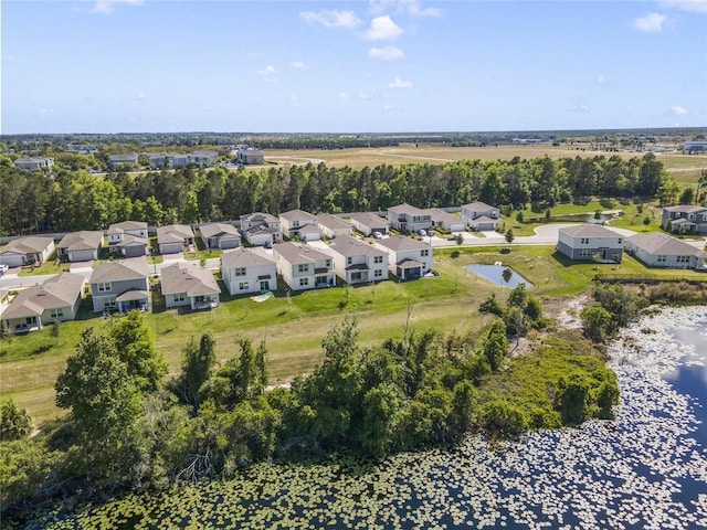 birds eye view of property with a residential view