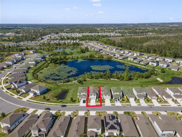 bird's eye view featuring a residential view and a water view